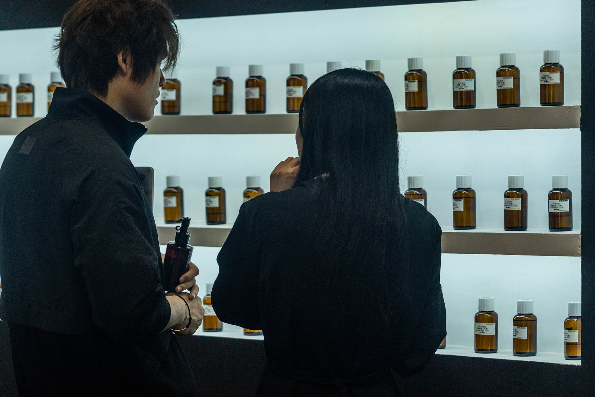 Visitors at CBE looking at some cosmetics