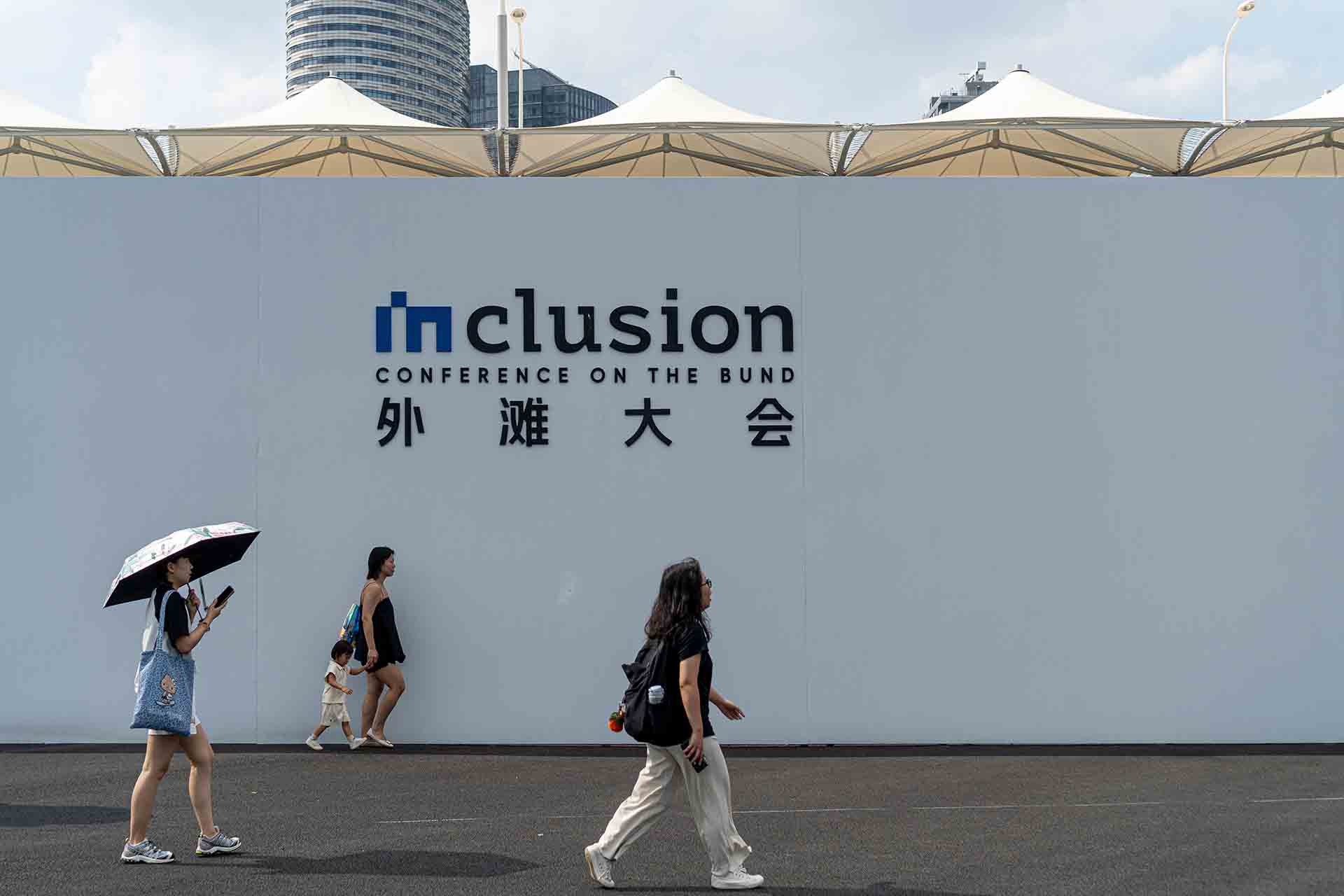 AI Inclusion 2025 event logo displayed prominently