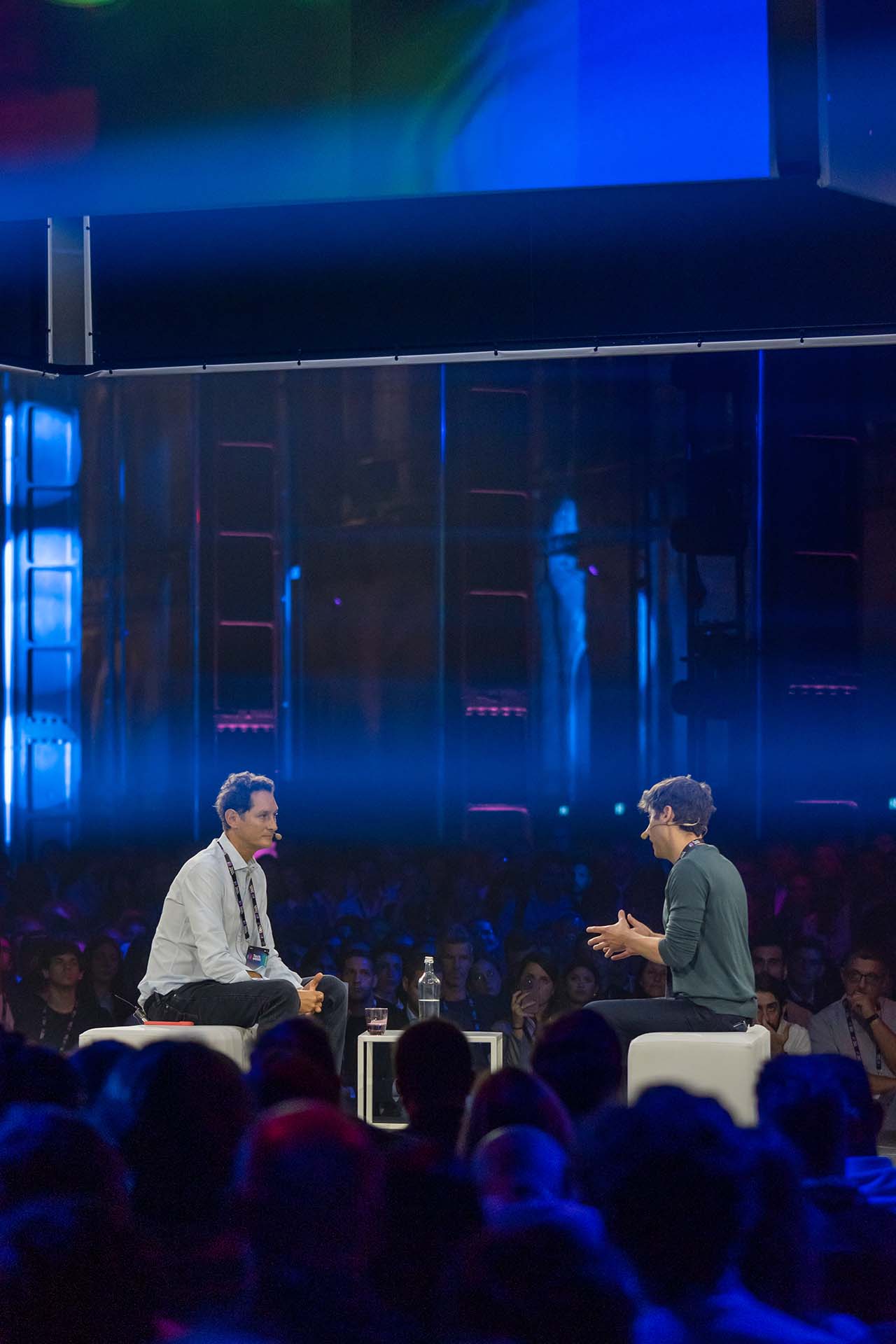 Sam Altman and John Elkann discuss before audience