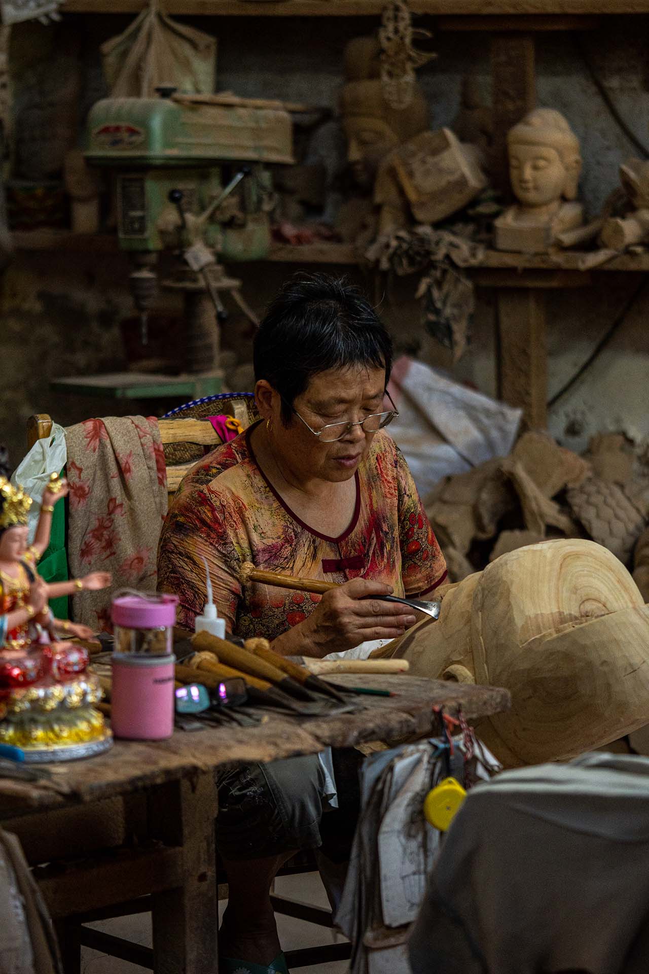 Experienced woman working in the workshop