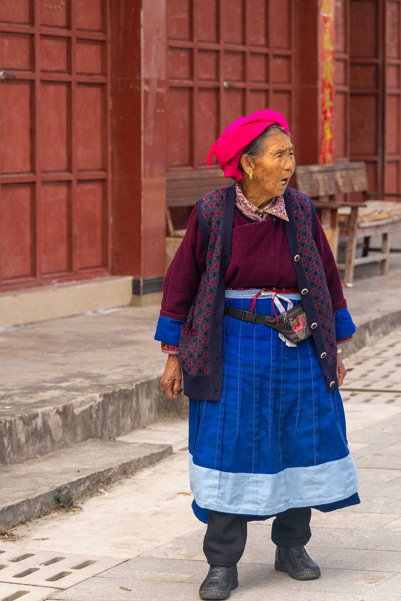 Ethnic minority woman in traditional attire in Cizhong
