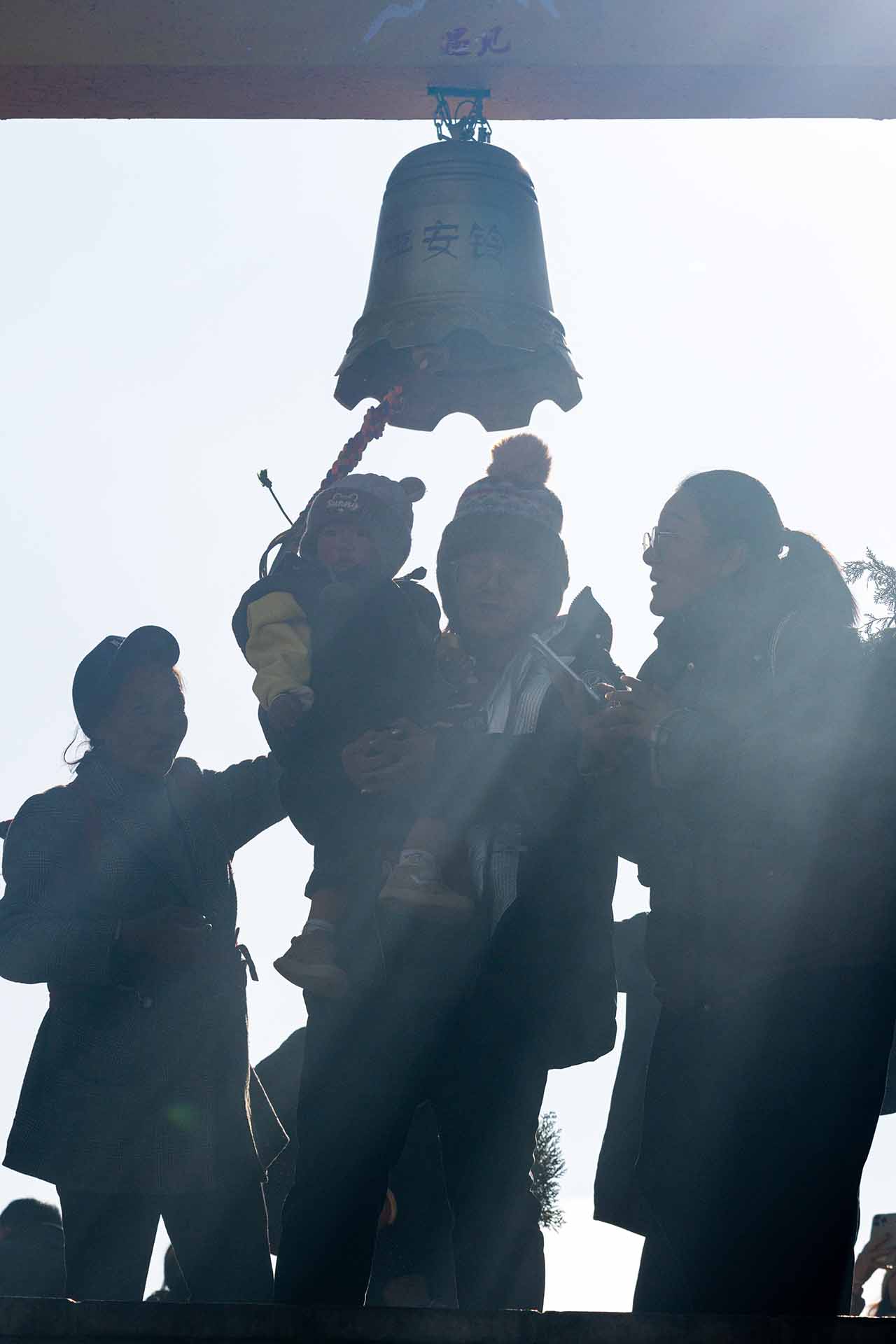 Worshippers and families gathering in Deqing
