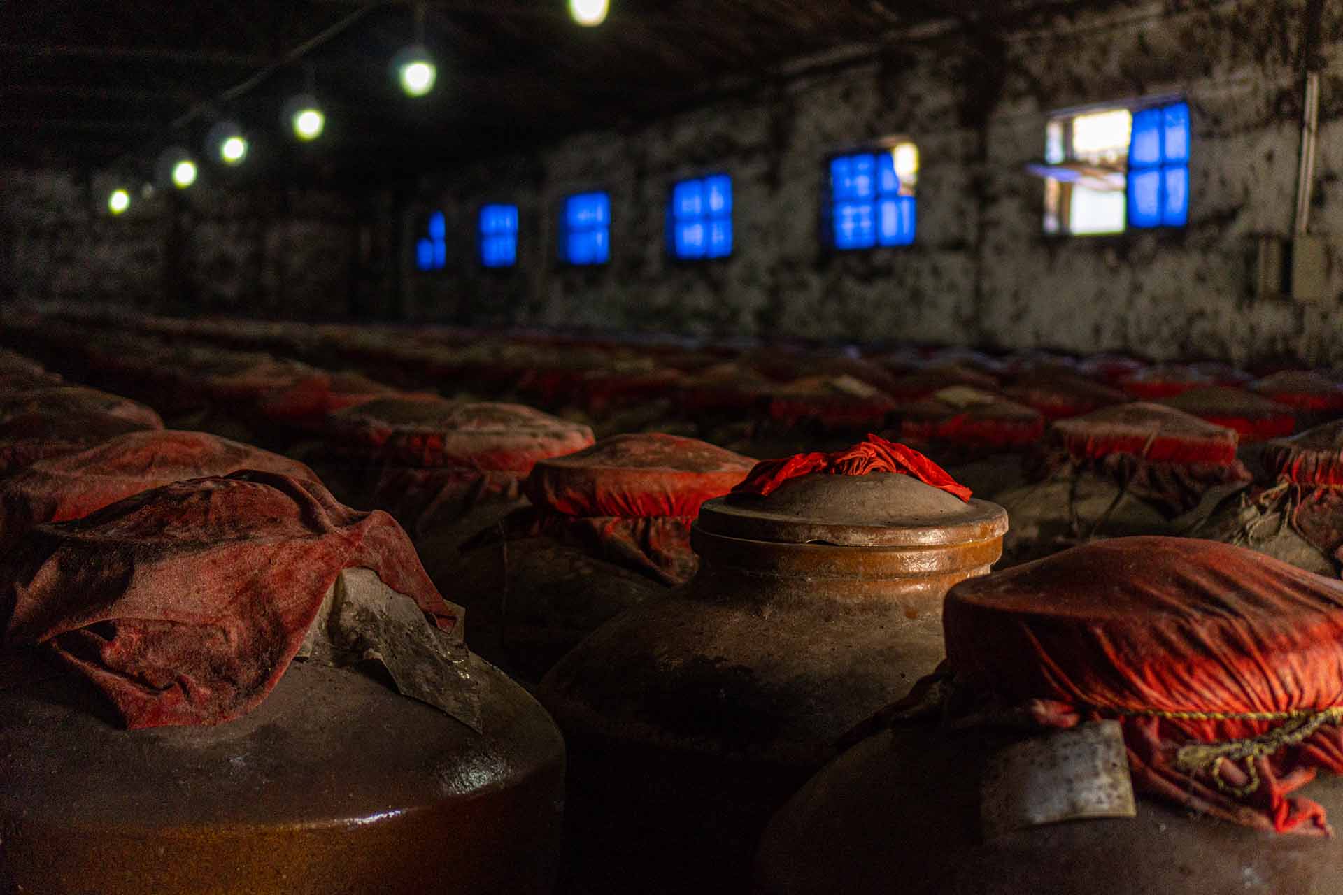 Baijiu containers left to age in storage